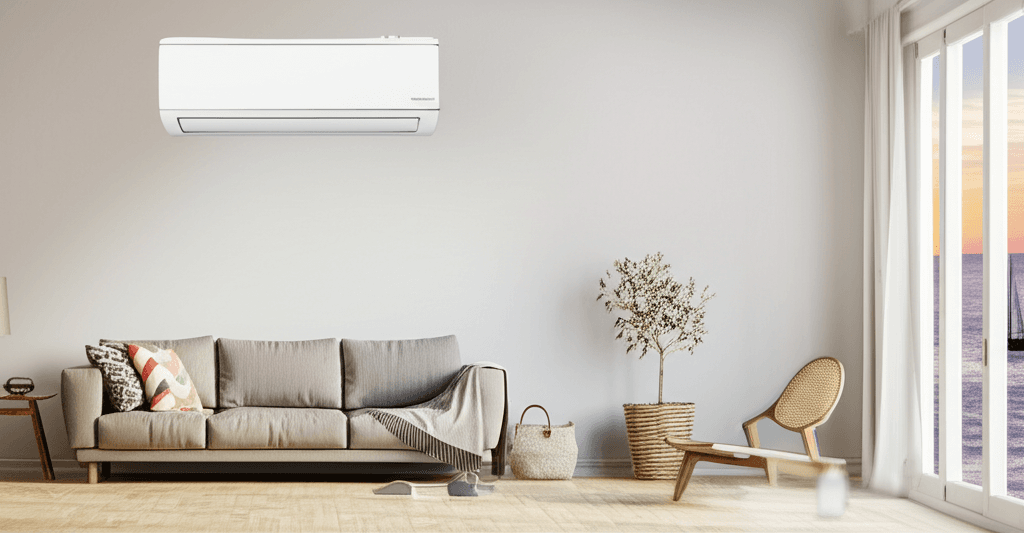 Technician installing a ductless mini-split air conditioning system